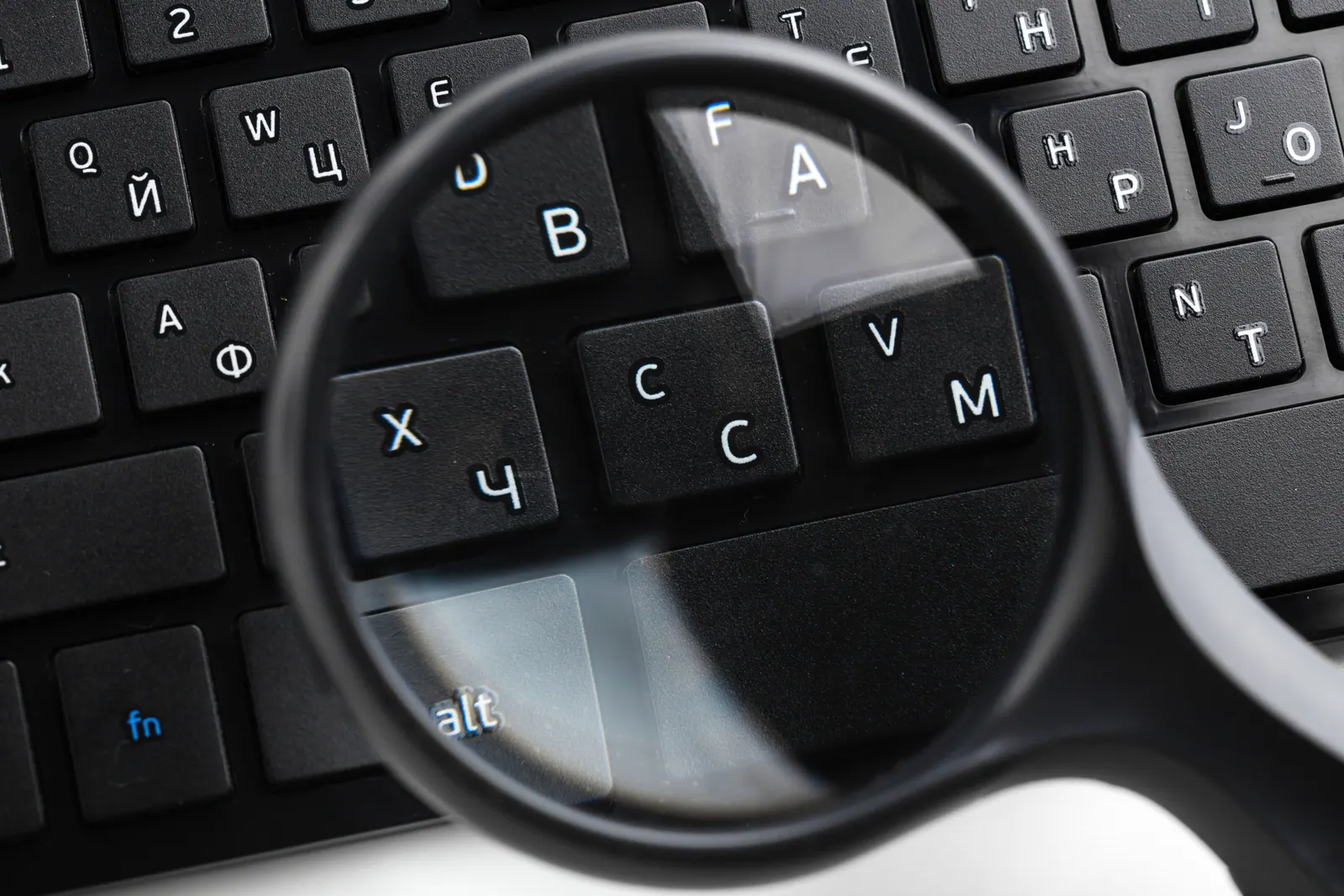 Quality Assurance Concept Image - magnifying glass over code, checklist